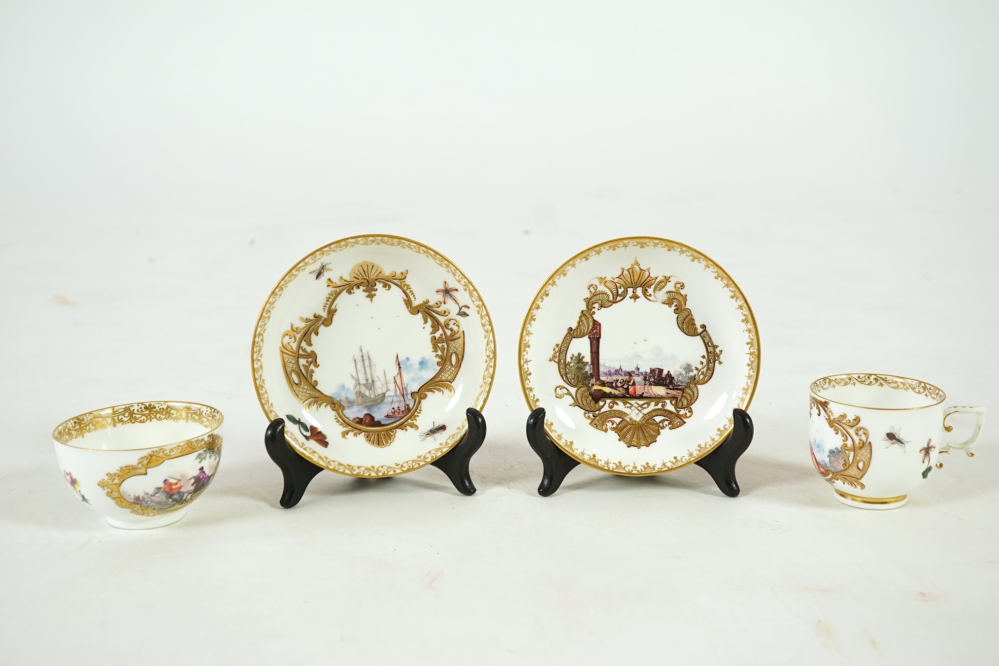 A Meissen cup and saucer, similar tea bowl and two saucers, c.1735-45